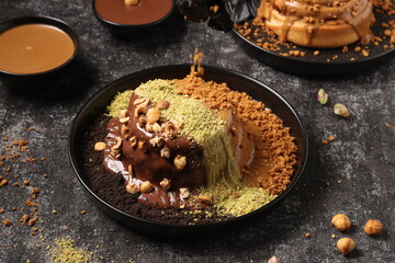 Delicious Cinnabon painted on a dark black background