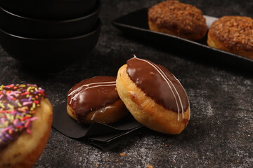 Delicious donut on a consistent ground and a distinctive product