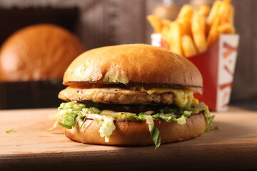 Homemade cheeseburger on an upscale table for lunch and dinner