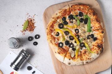 Delicious pizza with a sophisticated background of cheese and vegetables