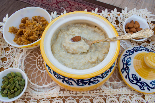 Kheer, Payasam, Phirni or rice pudding in bowl with ingretients. Healthy and home made dessert made with rice, milk and jaggery. It is very famous sweet dish of India.