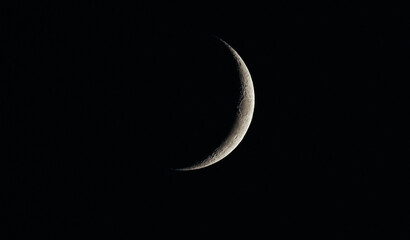 Waxing Crescent Moon, crescent Moon 3 days into. The lunar phases arise as the Moons orbit of the Earth shows the Earth-facing side moving into and out of the light of the Sun. planet of earth is moon - obrazy, fototapety, plakaty