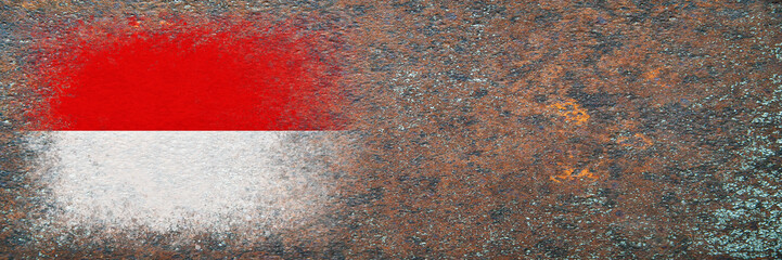Flag of Monaco. Flag painted on rusty surface. Rusty background. Copy space. Textured creative background