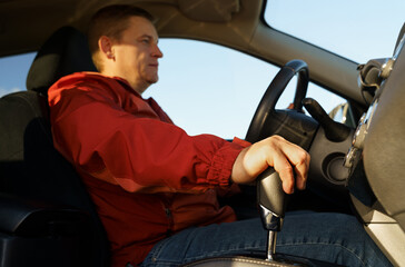 The driver activates the drive option in the automatic transmission.