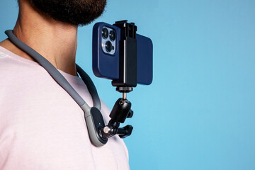 neck mount for phone. Equipment for shooting video on the phone