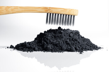 Concept of deep and detailed cleaning of the teeth. Black disclosing powder for bleaching. Dental...