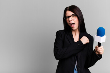 feeling happy and facing a challenge or celebrating. journalist or presenter with a micro