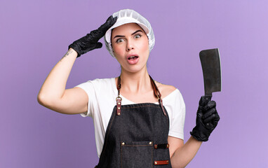 looking happy, astonished and surprised. butcher with a knife concept