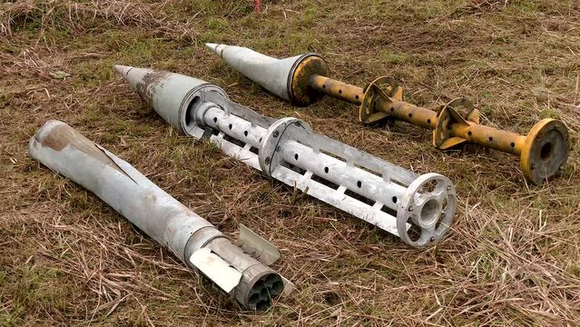 Remnants of cluster munitions on the ground. Clearance of unexploded ordnance and remnants of explosive ordnance. Russian-Ukrainian war 2022. Russia shells Ukrainian cities with cluster munitions