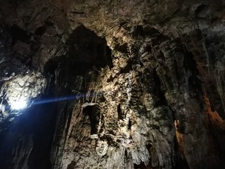 Beautiful stalactite rock formations deep inside cave. Resavska Pecina - Serbia