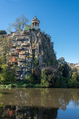 Paris, France - 11 13 2022: Park des Buttes Chaumont. View of the Temple of the Sibyl in the...