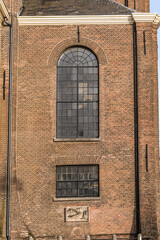 Obraz premium Oosterkerk (Eastern church) - 17th-Century Dutch Reformed church on Wittenburgergracht (Wittenburger) canal on Wittenburg in Amsterdam, The Netherlands.