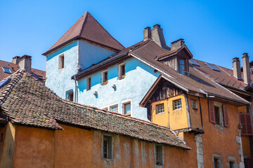 Old town of Annecy with river Thiou, medieval palace the Palais de l'Isle, Annecy, France 