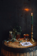 still life with Manhattan whiskey cocktail on bourbon barrel	