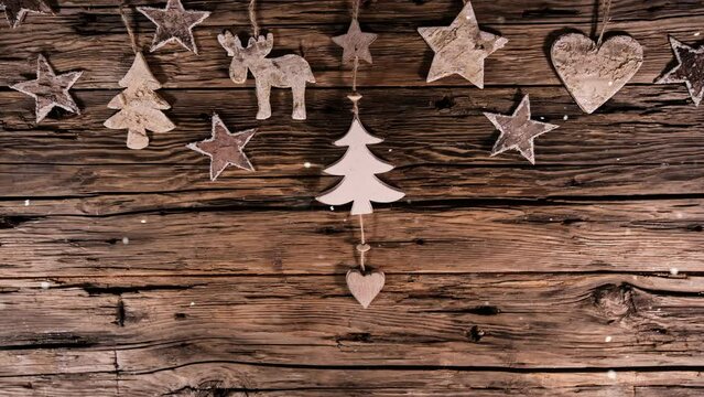 Christmas Still Life with Wooden background and Snowflakes Falling. Super Slow Motion Filmed on High Speed Cinema Camera at 1000 fps.