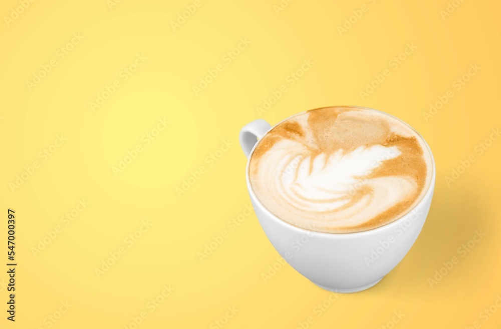 Wall mural cup of tasty sweet hot coffee on desk