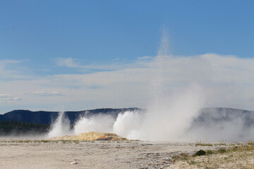 Fototapeta na wymiar water geyser erupting in cascades