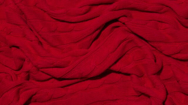 Red knitted wool fabric texture background - Stop Motion Animation