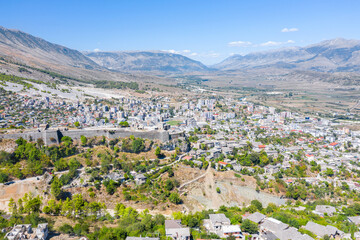 Fototapeta na wymiar Gyrocaster. Albania. Fortress. View of the city from above. White buildings in the center of the Gyrocastra. Drone shooting