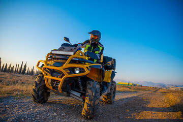 Obraz premium Girl riding a quad bike