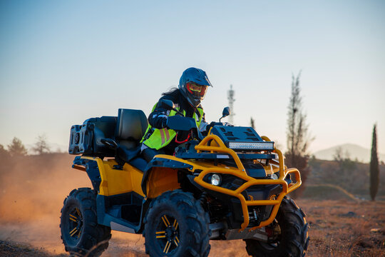 Girl riding a quad bike