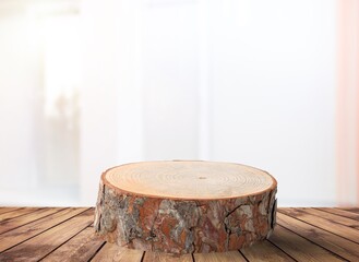 Blank empty wooden table with window background.