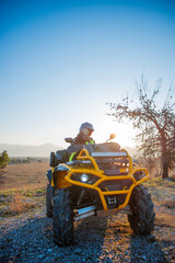 Fototapeta premium Girl riding a quad bike