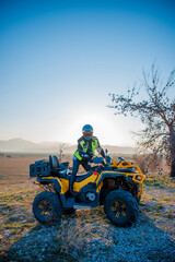 Obraz premium Girl riding a quad bike