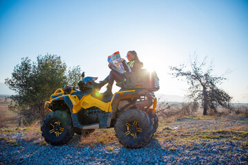 Obraz premium Girl riding a quad bike