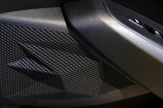 Close up of grid of car sound speaker