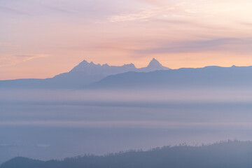 Magical purple and pink sunrise or sunset in the mountains