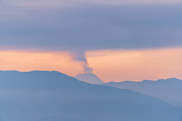 Magical purple and pink sunrise or sunset in the mountains