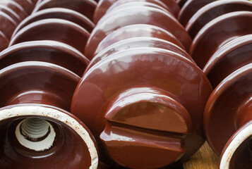 Ceramic disc insulators.