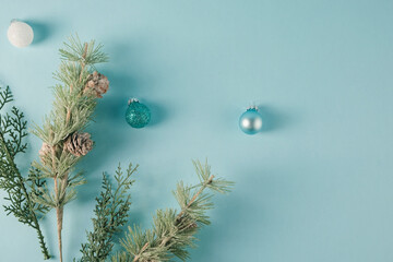 Blue Christmas background with ornaments and copy space for banner.