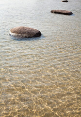 Stones in shallow water.