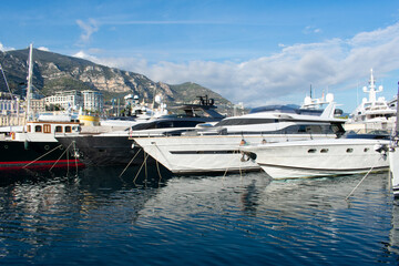 Fototapeta na wymiar Yachts and boats in Marina Monte Carlo, Monaco