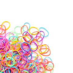 Heap of office colorful rubber bands isolated on white background