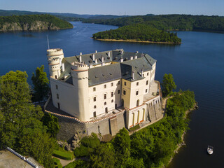 Aerial view of Orlik castle over Orlik reservoir. Beautiful gothic landmark over the lake. Orlik nad Vltavou, South Bohemia, Czech republic. - obrazy, fototapety, plakaty