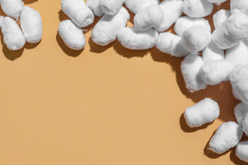 Soft cotton balls on color background