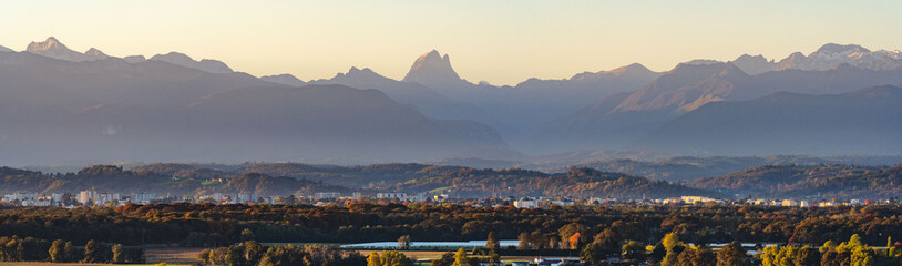 Panoramic view of Pau and the Pyrenees (Pic du Midi d'Ossau) during automn season and at sunrise....