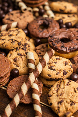 Dark and milk chocolate products and biscuits