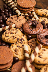 Dark and milk chocolate products and biscuits