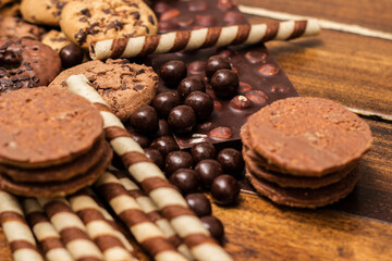 Dark and milk chocolate products and biscuits