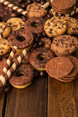 Dark and milk chocolate products and biscuits