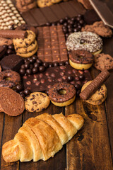 Large group of delicious pastries and chocolates