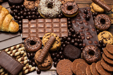 Large group of delicious pastries and chocolates