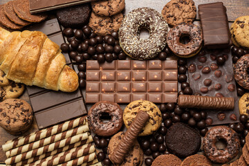 Large group of delicious pastries and chocolates
