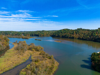 Fototapeta na wymiar Aerial view of water at Morgan Falls Overlook Park clear blue sky