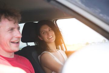 couple in car. Couple in love. Car. Travel. Vacation. Happy day. Sensual. Happy day. 