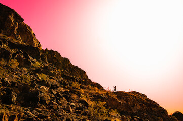 Sara Mountain Park trails arid desert sunset landscape with red rock sandstone formation in Lake Havasu City, Arizona